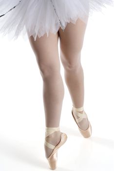 dancer in a white tutu on a white background