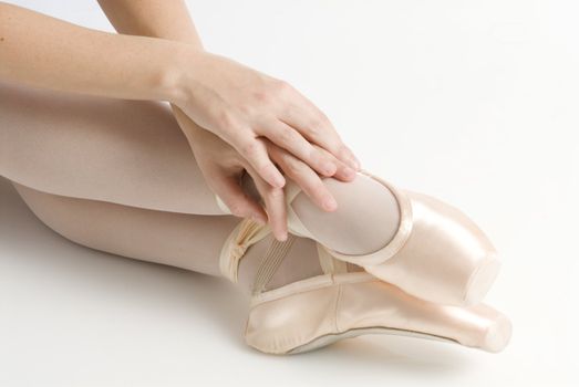 dancer in ballet shoes dancing in pointe