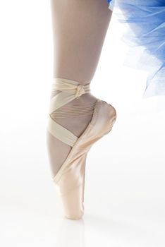 dancer in ballet shoes dancing in pointe