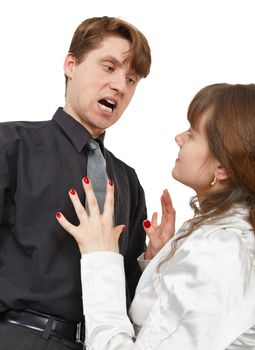 The man terribly shouts at the young woman is isolated on a white background