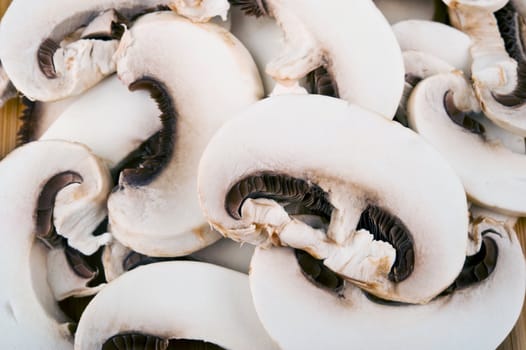 Close up image of a group of sliced mushrooms