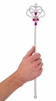 Magic wand in the hand on white background