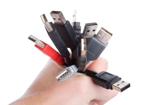 many usb cables in hand, isolated on white