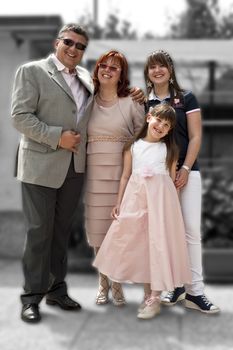 
A family on the day of First Communion
