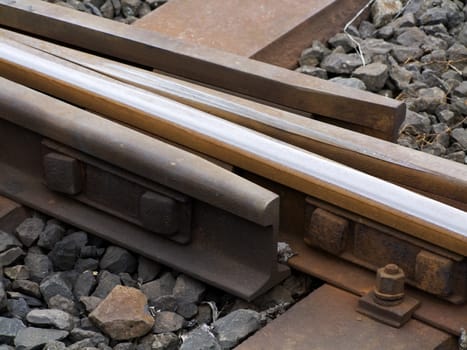 Detail from a train track at the countryside.