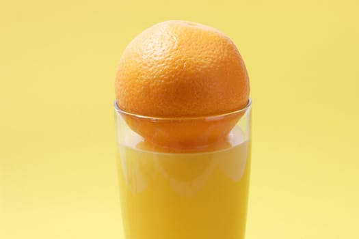 Orange juice on bright background