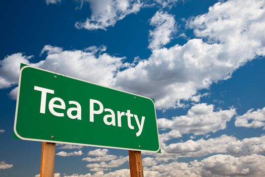Tea Party Green Road Sign with Copy Room Over The Dramatic Clouds and Sky.
