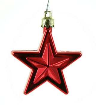 A single isolated red Christmas star hanging.
