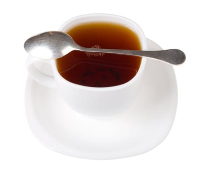 cup and spoon with black tea, isolated on white