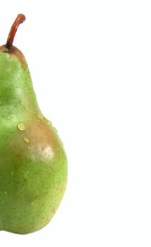 Green pear with water drops on white background