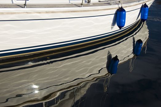 closeup of a boat and its reflection