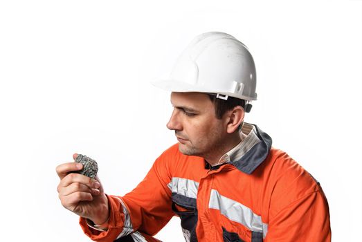 Mine engineer checking mineral isolated on white stock photo