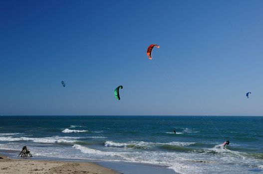 A driftwood teepee sets the scene for kitesurfing fun