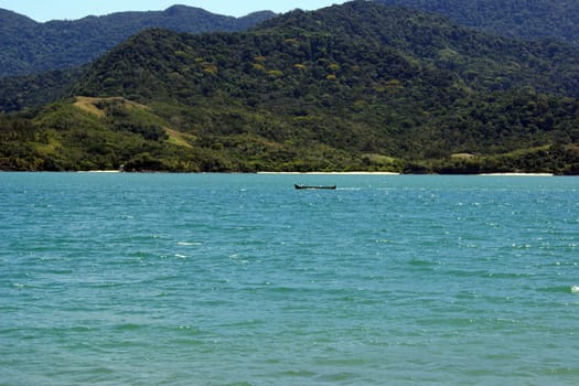 Beautiful view of the sea, mountains and a lone boat