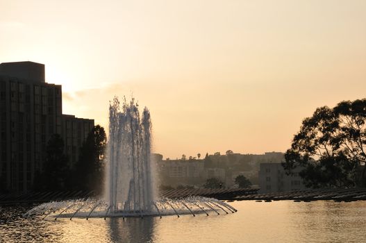Downtown Los Angeles plaza fountain at sunset