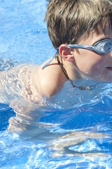 Picture of a boy on a swimming pool