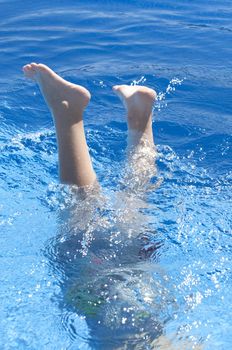 Picture of a boy on a swimming pool