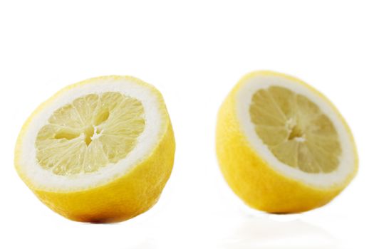 focus on one half lemon in front of another half lemon