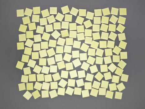 Yellow Adhesive Notes on grey background