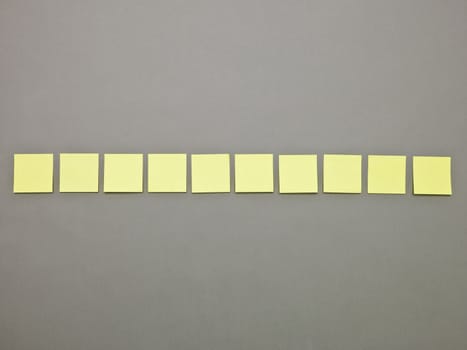 Yellow Adhesive Notes in a row