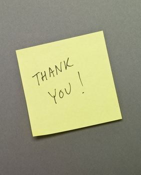 Adhesive Note with "Thank You" wrote on it
