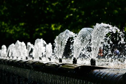 outdoor fountain splashing cool water