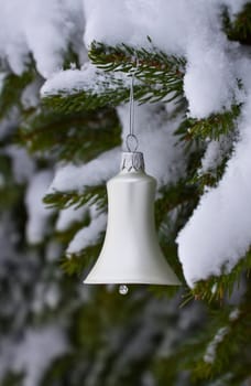 This image shows a white bell for a Christmas Tree