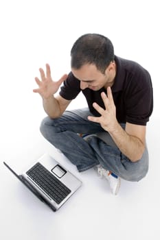 pleased man looking to laptop on an isolated background