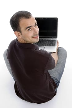 back pose of man with notebook against white background