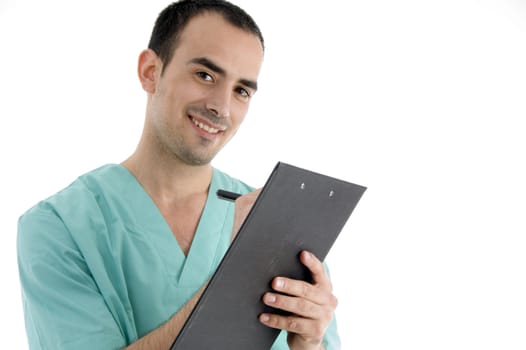 doctor writing on notepad on an isolated white background