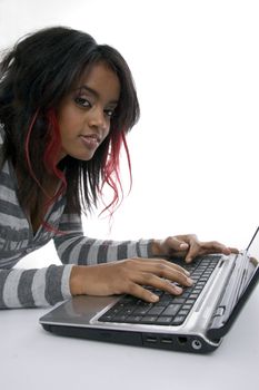 girl working on laptop against white background