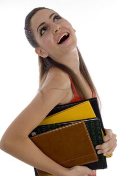 school girl looking upward on an isolated white background