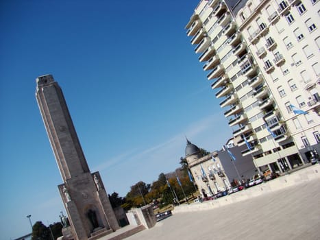 A view of Monumento a la Bandera (Flag Monument) in Rosario, Agentina; and buildings.