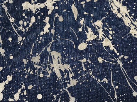 Blue denim stained cloth background / jean texture