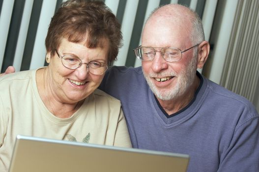 Senior Adults on Working on a Laptop Computer