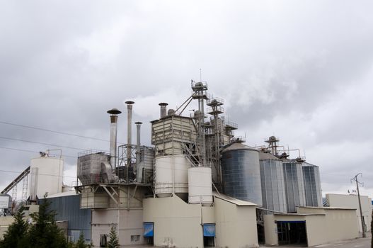 Picture of an industry landscape with great clouds and materials