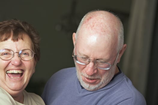 Happy Senior Adult Couple Laughing