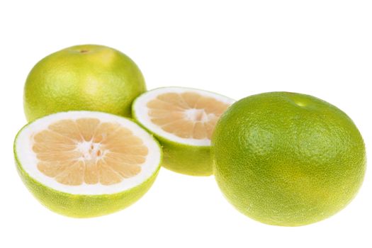  Big green grapefruits close-up on white background