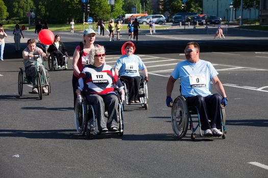 RIGA, LATVIA - MAY 23: Disabled people participate in the Riga International Marathon in May 23, 2010, Riga.