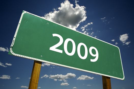 2009 Road Sign with dramatic clouds and sky.