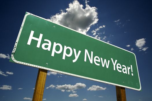 Happy New Year Road Sign with dramatic clouds and sky.
