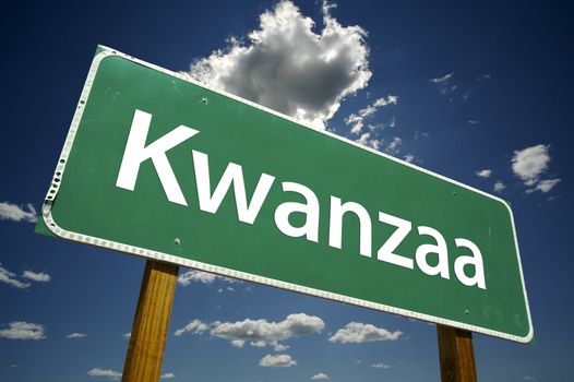 Kwanzaa Road Sign with dramatic clouds and sky.