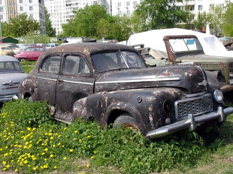 Very old black car at the technique ruins