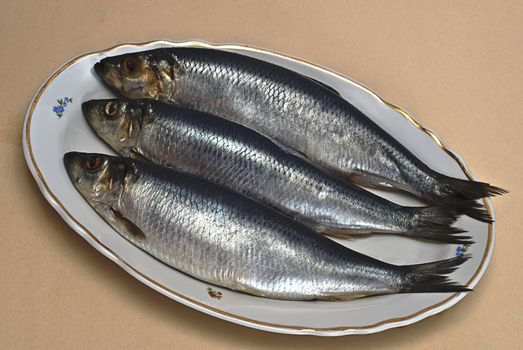 three herring on table