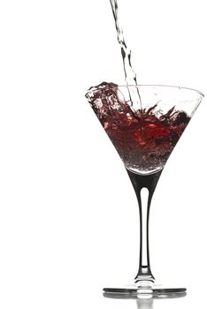 Cocktail preparation from red martini isolated on white