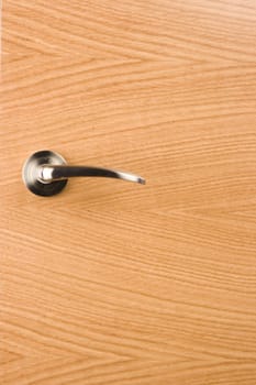 locked wood door and lock handle inside a house as a background