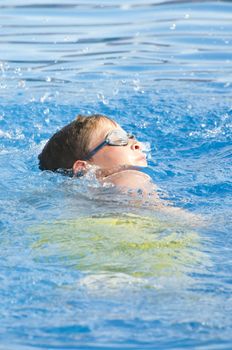 Picture of a boy on a swimming pool