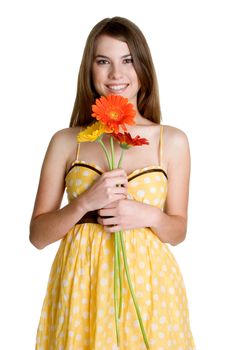Pretty teen girl holding flowers