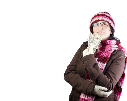 adult christmas woman thinking in what to buy holding a dollar note