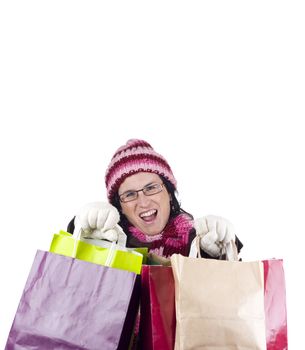 Consumerist Christmas girl with bags in a shopping day